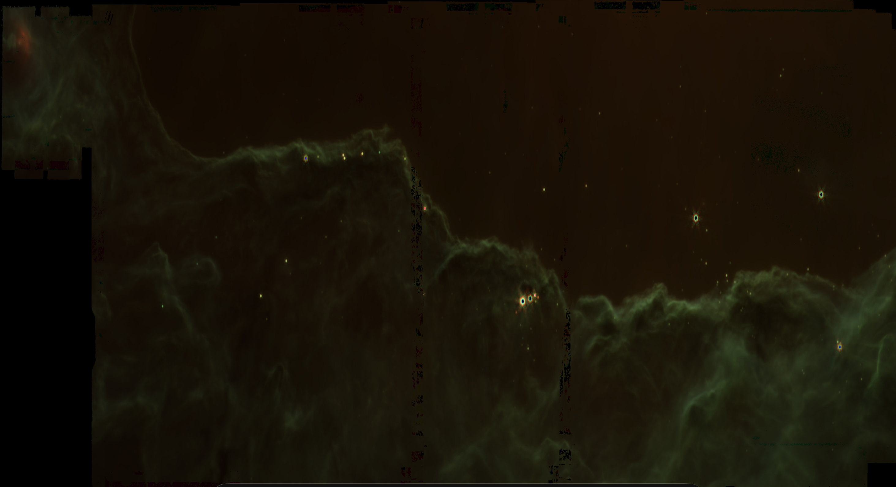 JWST 3-channel RGB composite of a nebula region showing green-tinted gas and dust structures