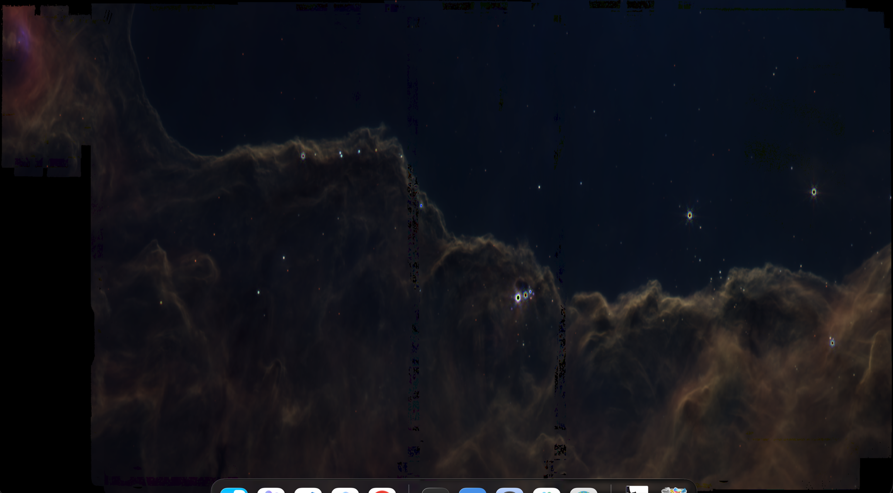 Same JWST composite with swapped channel order showing warmer orange-brown tones