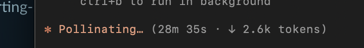 Claude CLI pollinating status showing 28 minutes and 35 seconds of processing time