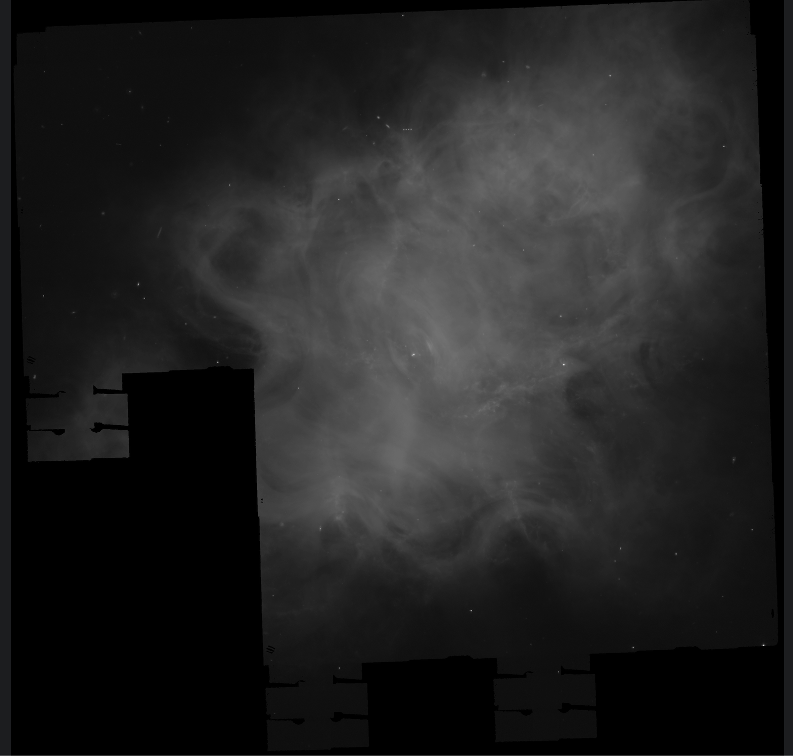 Grayscale FITS mosaic showing visible sensor edge artifacts as dark bands